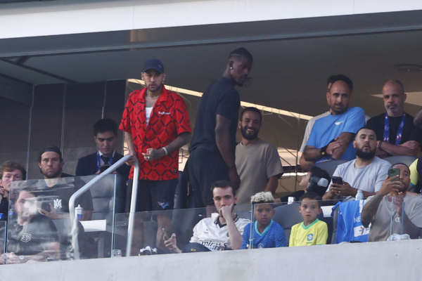 INGLEWOOD, CALIFORNIA - JUNE 24: Neymar Jr. and NBA player Jimmy Butler look on from the stands during the CONMEBOL Copa America 2024 Group D match between Brazil and Costa Rica at SoFi Stadium on June 24, 2024 in Inglewood, California. 